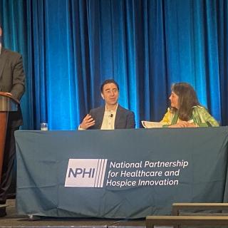 Ab Brody, Maureen Leahy, and Cameron Muir unveiling the partner guide at the NPHI Annual Summit on May 9, 2024